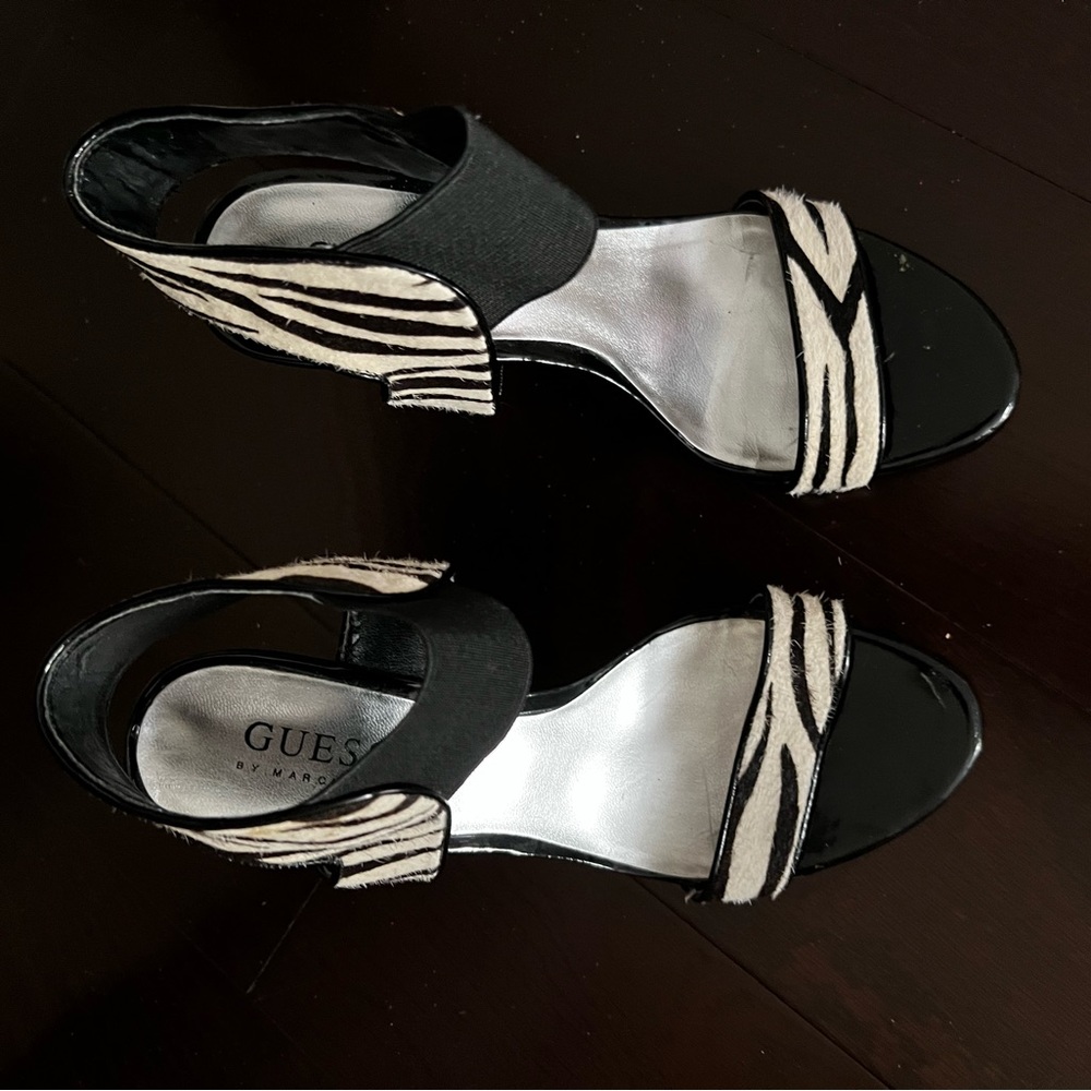 Guess zebra print animal hair black & white sandal with red patent leather heel.